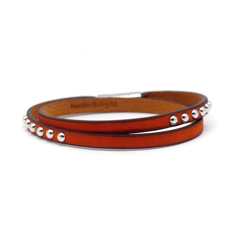 Bracelet en cuir artisanal pour femme Sirli avec un design à la fois classique et original. Made in France, haut de gamme. Couleur orange potiron. Fabriquée en France.