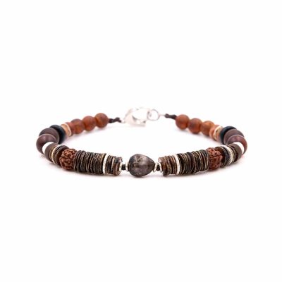 Bracelet en cuir artisanal et à perles pour homme Caracara avec un design à la fois classique et original. Made in France, haut de gamme. Couleur marron/bordeaux sangria. Fabriqué en France.