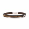 Bracelet en cuir artisanal pour homme Condor avec un design à la fois classique et original. Made in France, haut de gamme. Couleur marron foncé pain brulé avec boucle argentée. Fabriqué en France.