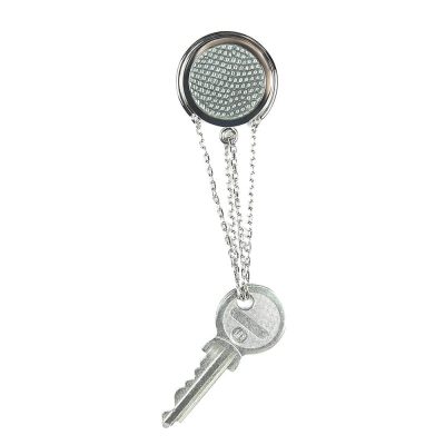Porte-clé en cuir artisanal et métal Loriot. Made in France, haut de gamme. Couleur noir et argent. Fabriqué en France.