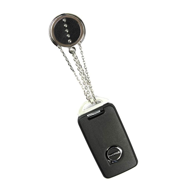 Porte-clé en cuir artisanal et métal Loriot. Made in France, haut de gamme. Couleur noir et argent. Fabriqué en France.