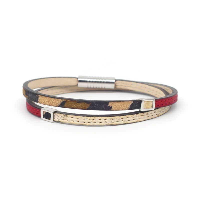 Bracelet en cuir artisanal Arlequin avec un design classique et original. Couleur panthère, python et rouge rubis. Accessoire de luxe fabriqué en France.