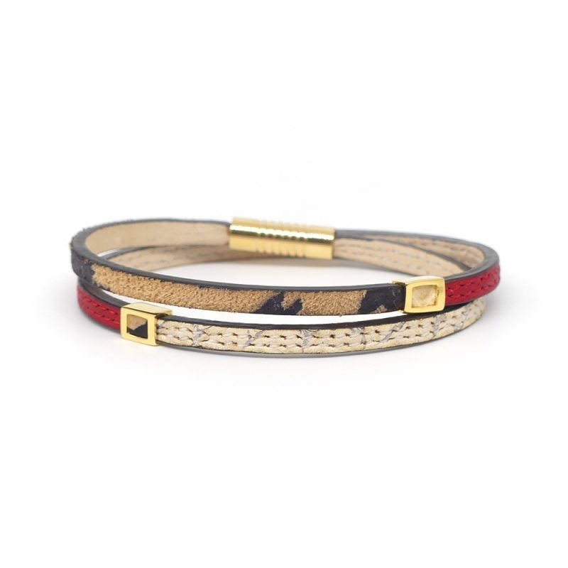 Bracelet en cuir artisanal Arlequin avec un design classique et original. Couleur panthère, python et rouge rubis. Accessoire de luxe fabriqué en France.