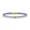 Bracelet en cuir artisanal Colibri avec un design classique et original. Couleur ciel et or. Accessoire de luxe fabriqué en France.