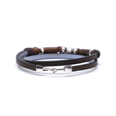 Bracelet en cuir artisanal et à perles pour homme le bonobo avec un design à la fois classique et original. Made in France, haut de gamme. Couleur marron noisette avec boucle en argent. Fabriqué en France.